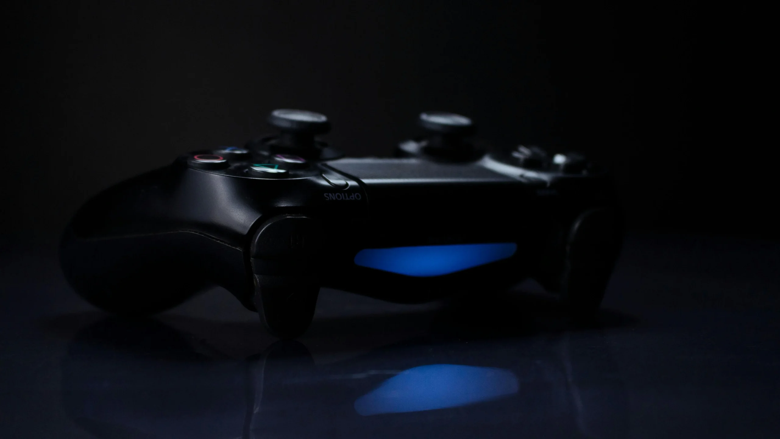 Gaming controller in low light, Directive 8020 multiplayer co-op session