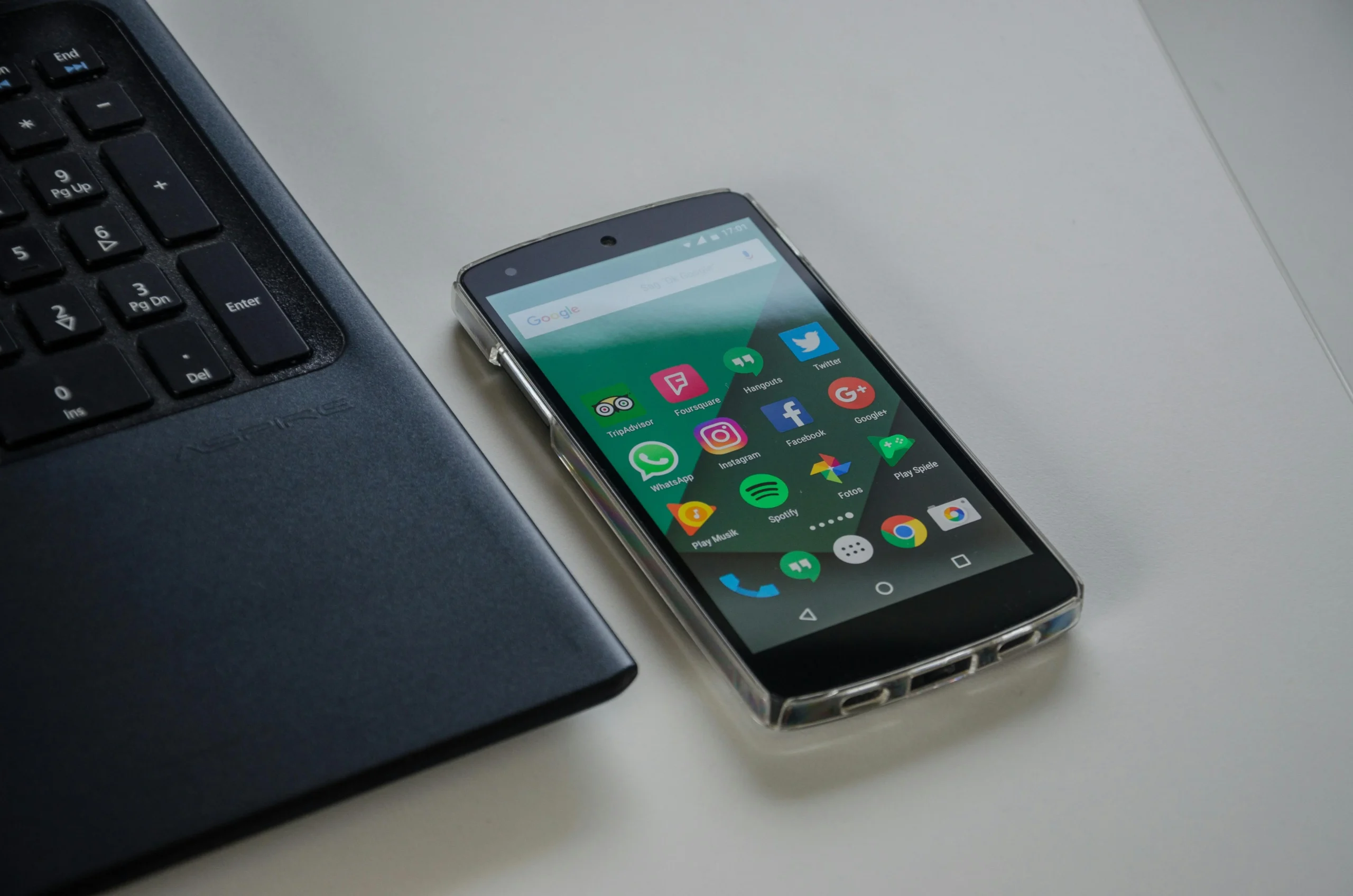 Android smartphone and laptop together, showing seamless phone-laptop integration