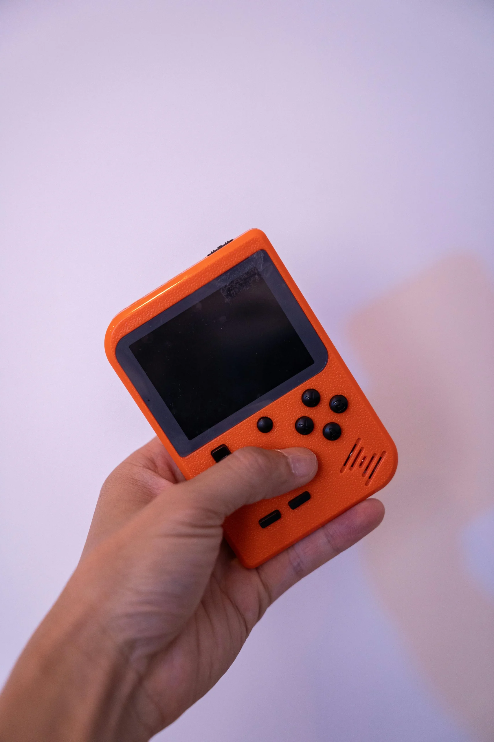 Handheld gaming session on a portable Nintendo Switch console