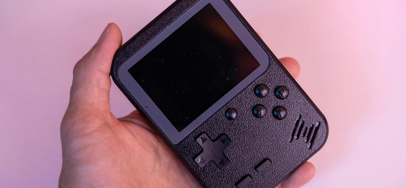 Nintendo Switch handheld console with games being played