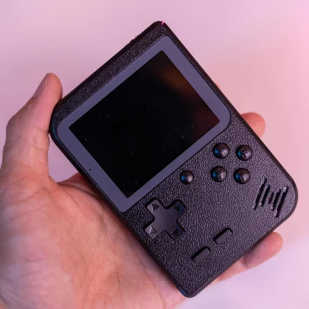 Nintendo Switch handheld console with games being played