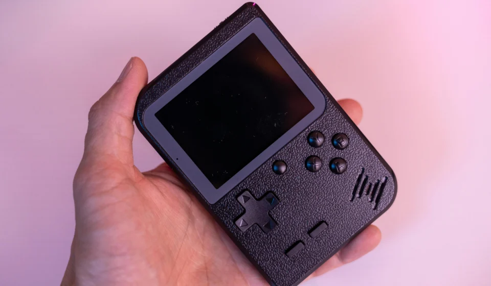 Nintendo Switch handheld console with games being played